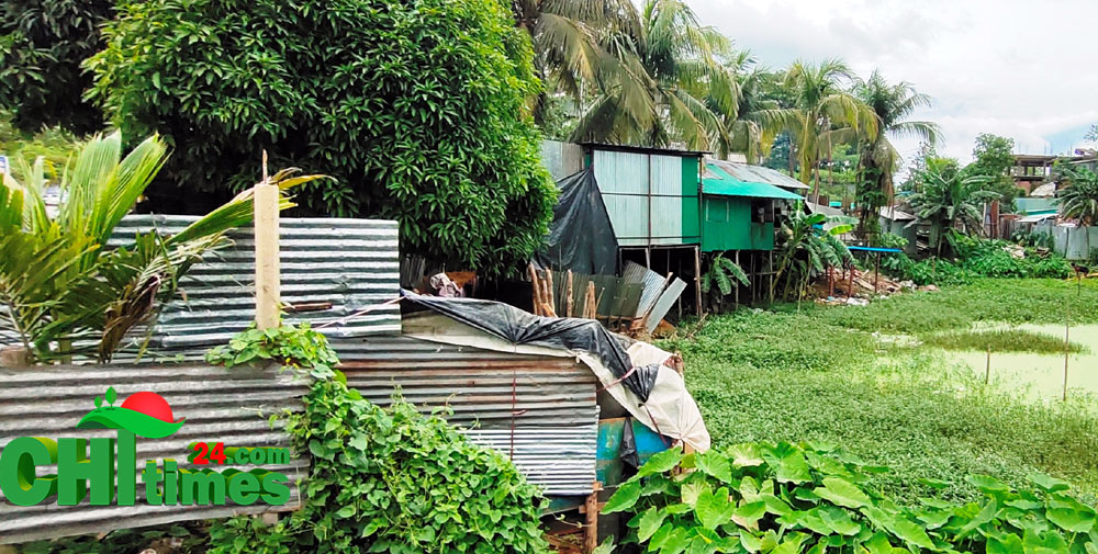 বান্দরবানে ক্ষমতার দাপটে পুকুর ভরাট করে দোকান নির্মাণ !